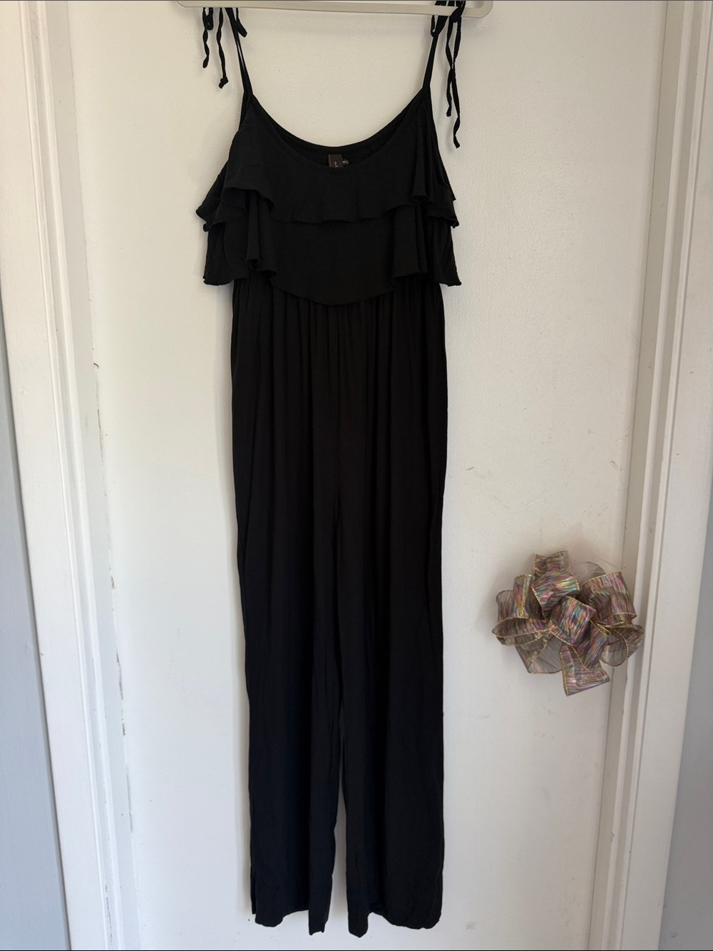 Sleeveless Black Ruffle-Trim Jumpsuit with Tie Straps